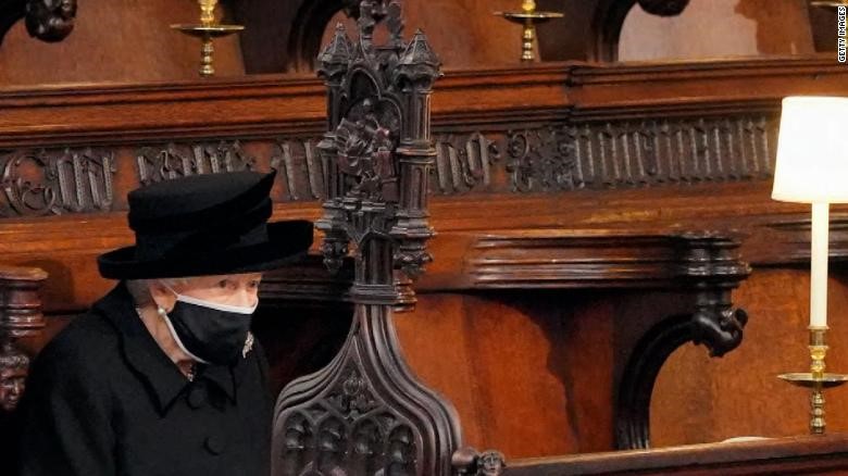 The queen sits quietly at the funeral of Prince Phillip